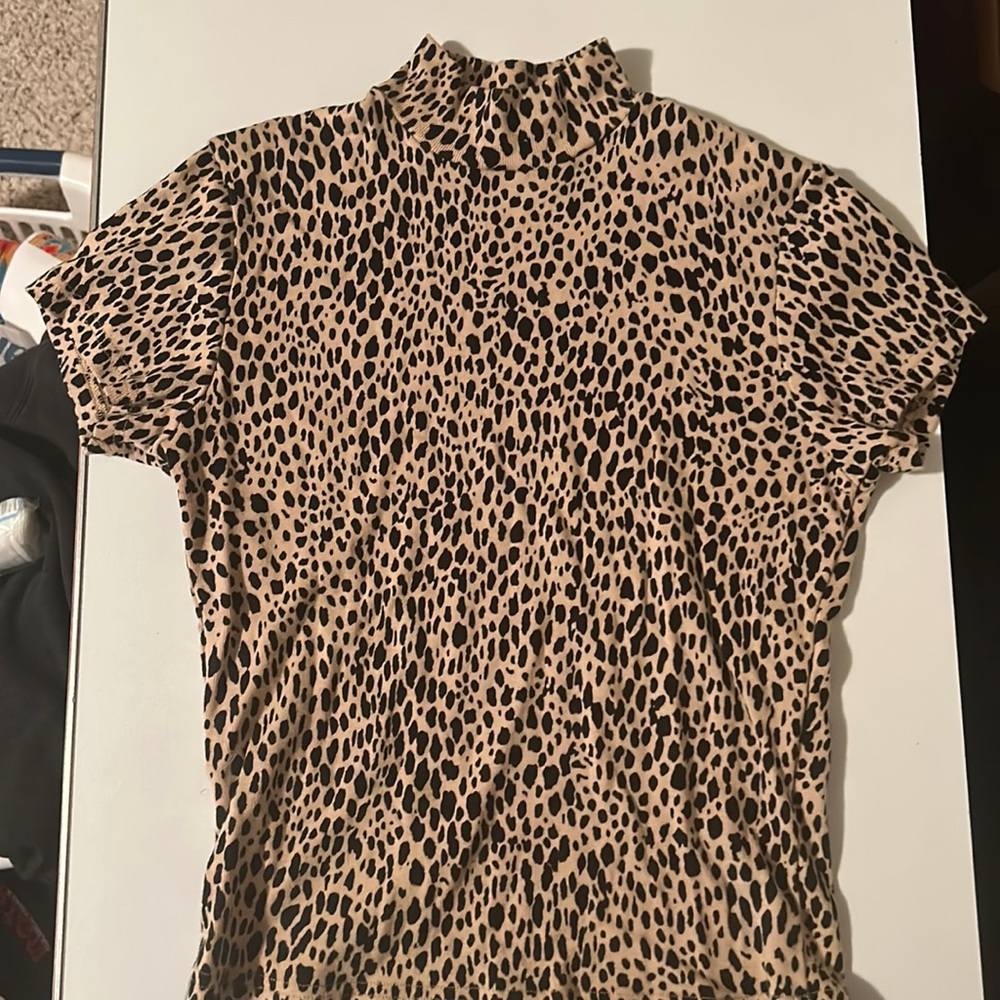 Cheetah print baby tee with slight turtle neck